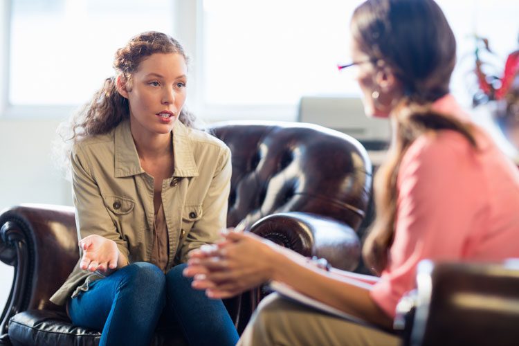 woman talking to her therapist in individual therapy - waypoint recovery center - substance use disorder treatment services - south carolina addiction treatment center - alcohol and drug rehab in SC