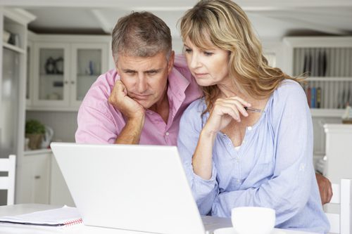 How to Bring an Addiction Professional into Your Intervention - couple searching the internet
