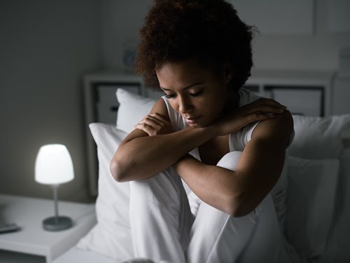 Coping with Insomnia in Recovery - woman with insomnia
