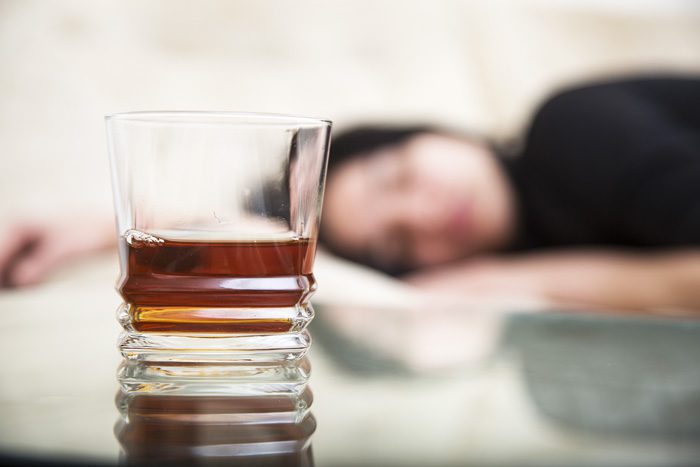 facts about alcohol use disorder alcohol, Facts About Alcoholism You Might Not Know, Facts, Alcohol Abuse Facts, glass of liquor with girl laying down in background