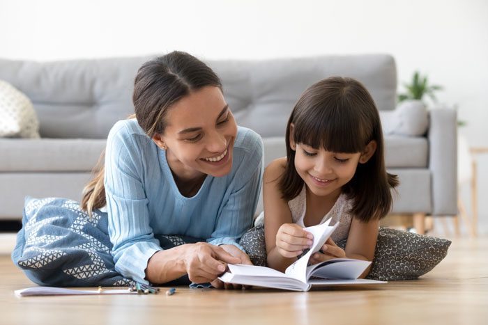 6 Tips for Parents in Recovery, Being a Better Parent in Recovery, Parenting in Addiction Recovery, Parenting While in Recovery, Parents in Recovery, Preschoolers, woman reading with her young daughter